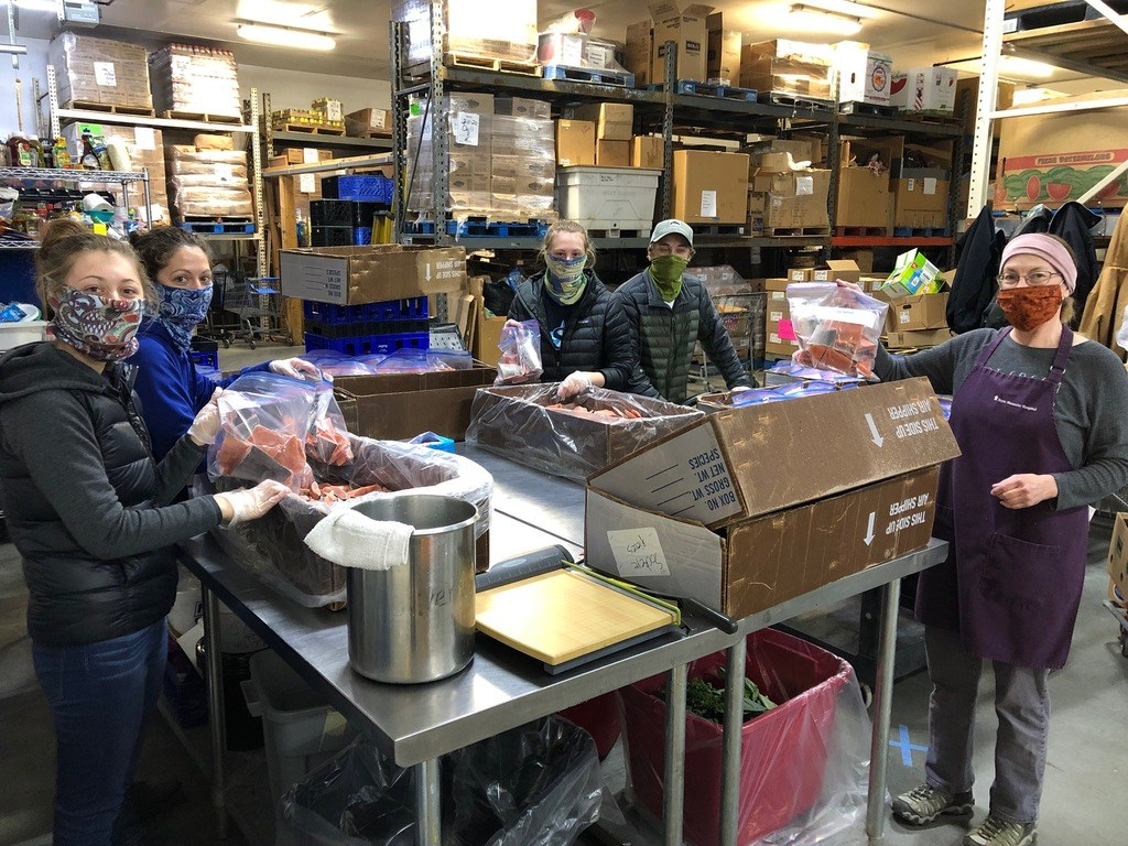 Kenai Extension Agents packing food at the Kenai Food Bank